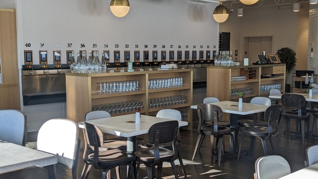 Indoor seating and self pour wall taps inside of Bear Cave Brewing in Hopkins, MN