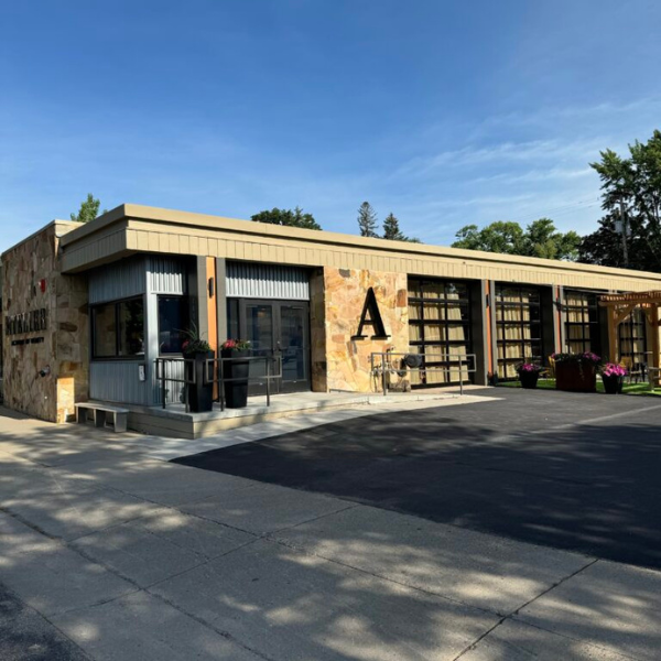 The front of the Atelier Academy of Beauty in the sunlight.